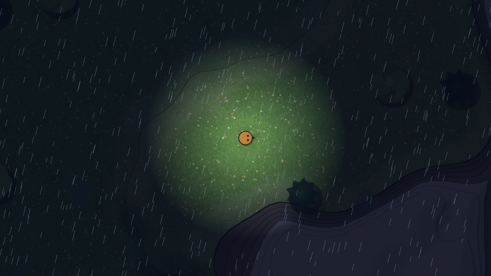 A rainy night with only a small circle of light around the player